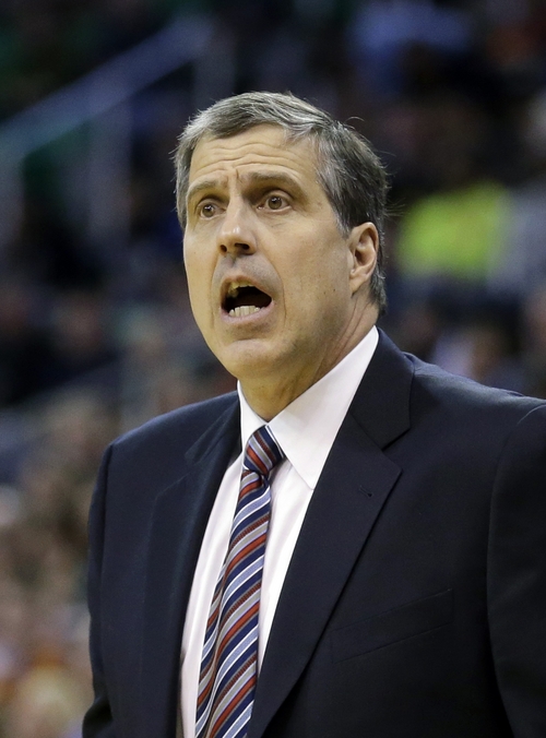 Washington Wizards coach Randy Wittman shouts to his team during the second quarter of an NBA basketball game against the Utah Jazz on Saturday, Jan. 25, 2014, in Salt Lake City. (AP Photo/Rick Bowmer)