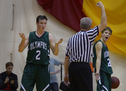Scott Sommerdorf   |  The Salt Lake Tribune
Olympus' Connor Haller reacts in surprise when he is whistled for a second half foul as team mate Alec Monson reacts at right. Olympus defeated Mountain View 73-64 in Orem, Friday, January 24, 2014.