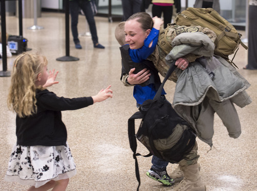 Steve Griffin  |  The Salt Lake Tribune


Adalynn and Wyatt Perry  run to their mother, Staff Sgt. Cortny Barton of the Utah Army National Guardís 204th Maneuver Enhancement Brigade, as she returns to Utah from a 10-month deployment to Afghanistan. The mission of the 204th was to conduct base operations and base defense for U.S. military installations in Northern Afghanistan in support of Operation Enduring Freedom.  Soldiers returned home at the Salt Lake International Airport in Salt Lake City, Utah Friday, January 24, 2014.