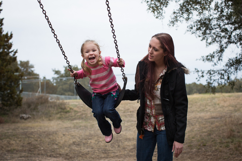 Maggie Barcellano plays with her three-year-old daughter, Zoe, at Lakeway City Park in Lakeway, Texas on Saturday, Jan. 25, 2014. Barcellano enrolled in the food stamps program to help save up for paramedic training while she works as a home health aide and raises her daughter. Working-age people now make up the majority in U.S. households that rely on food stamps, a switch from a few years ago when children and the elderly were the main recipients.  (AP Photo/Tamir Kalifa)