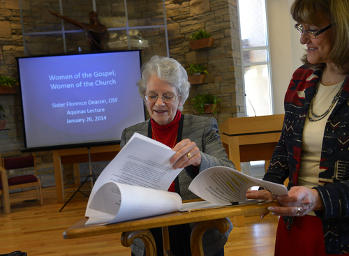 Scott Sommerdorf   |  The Salt Lake Tribune
Sister Florence Deacon OSF, Sr. Deacon, prepares her papers prior to speaking at the 2014 Aquinas Lecture at St. Catherine's/Newman Center, Sunday, Jan. 26, 2014.