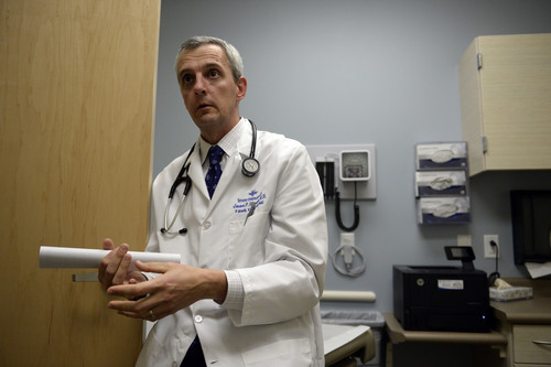 Francisco Kjolseth  |  The Salt Lake Tribune
Physician Jason Hamula talks about the health issues he has seen in his family practice, just miles from Hawthorne Elementary, where monitors record data about pollution in the valley. He says: "I'm well aware of the health effects of particulates -- I see it a lot this time of year in my practice."