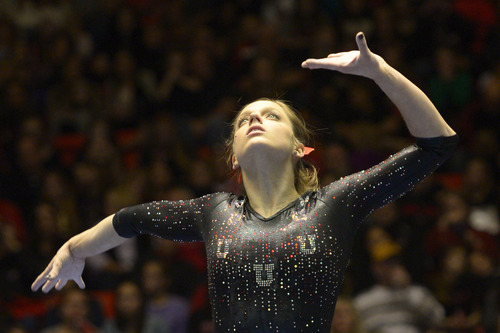 Rick Egan  | The Salt Lake Tribune 

Breanna Hughes competes on the beam for the Utes, in Pac12 gymnastics competition, Utah vs. UCLA, at the Huntsman Center, Saturday, January 25, 2014.