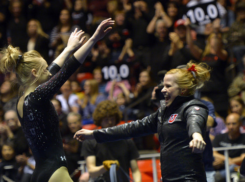 Rick Egan  | The Salt Lake Tribune 

Georgia Dabritz, is greeted by Tori Wilson after her performance on the floor for the Utes, in Pac12 gymnastics competition, Utah vs. UCLA, at the Huntsman Center, Saturday, January 25, 2014.
