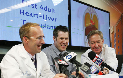 Steve Griffin | The Salt Lake Tribune
Mike Mader, 31, of Salt Lake City, center, laughs as his doctors describe his recent heart and liver transplant during a press conference at Intermountain Medical Center in Murray on Thursday. The medical center performed the first ever heart/liver transplant in the intermountain west on April 23, 2013.
