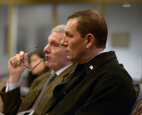 Al Hartmann  |  The Salt Lake Tribune
West Valley City Police Lt. John Coyle, right, appears with his attorney Erik Strindberg at the West Valley City Civil Service Commission Thursday January 16.