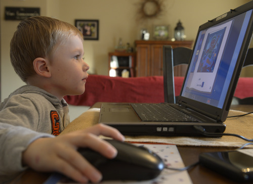 Rick Egan  | The Salt Lake Tribune 

Five-year-old Ashton VanLeeuwen  works on the UPSTART preschool software program at his home in West Jordan, Wednesday, January 22, 2014.