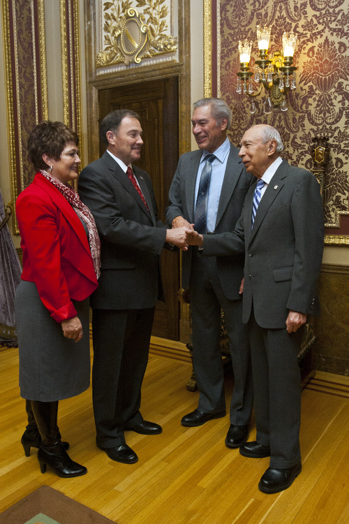 Chris Detrick  |  The Salt Lake Tribune
Utah Gov. Gary Herbert and First Lady Jeanette Herbert meet with Waldo Udarbe , left, and Clarence Udarbe before his State of the State address at the Utah State Capitol Wednesday January 30, 2013.
