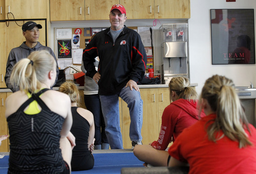 Al Hartmann  |  Tribune file photo
Utah gymnasts co-head coach Greg Marsden holds a team meeting before a work out.
