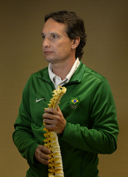 Steve Griffin  |  The Salt Lake Tribune


Antonio Marttos, Team Brazilian Physician, holds a spinal column model as he talks with members of the media during a press conference updating the condition Lais Souza, a 25-year-old member of the Brazilian Winter Olympic team, who was critically injured while training in Park City, Utah on Monday January 27, 2014. Doctors said she is currently being cared for in the Neuro Critical Care Unit at University of Utah Hospital in Salt Lake City. Lais suffered a severe cervical spinal cord injury. Press conference was held at the University of Utah Guest House in Salt Lake City, Utah Thursday, January 30, 2014.