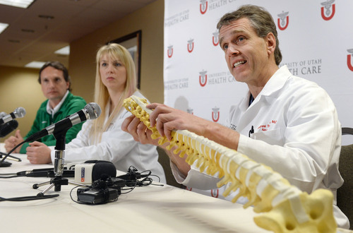 Steve Griffin  |  The Salt Lake Tribune


Antonio Marttos, Team Brazilian Physician, left, and Holly Ledyard, University of Utah Health Care Neurointensivist , listen as Andrew Dailey, University of Utah Health Care Neurosurgeon, uses a spinal column model to show where Lais Souza, a 25-year-old member of the Brazilian Winter Olympic team, dislocated her neck between the third and fourth cervical, during a press conference updating the condition  of Souza who was critically injured while training in Park City, Utah on Monday January 27, 2014. The doctors said she is currently being cared for in the Neuro Critical Care Unit at University of Utah Hospital in Salt Lake City. Press conference was held at the University of Utah Guest House in Salt Lake City, Utah Thursday, January 30, 2014.