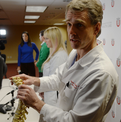 Steve Griffin  |  The Salt Lake Tribune


Andrew Dailey, University of Utah Health Care Neurosurgeon, uses a spinal column model to show where Lais Souza, a 25-year-old member of the Brazilian Winter Olympic team, dislocated her neck between the third and fourth cervical, during a press conference updating the condition  of Souza who was critically injured while training in Park City, Utah on Monday January 27, 2014. The doctors said she is currently being cared for in the Neuro Critical Care Unit at University of Utah Hospital in Salt Lake City. Press conference was held at the University of Utah Guest House in Salt Lake City, Utah Thursday, January 30, 2014.