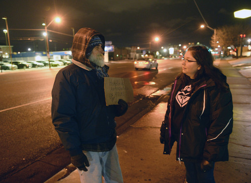 Al Hartmann  |  The Salt Lake Tribune	
Lilian Browne, case manager with Volunteers of America, interviews  "Steven" a homeless man, Wednesday Jan. 30, 2014, at 5:30 a.m. in downtown Salt Lake City. He panhandles for change on the sidewalk outside the McDonalds drive through at 500 South. Each year, Volunteers of America, in conjunction with other agencies, takes a head count of homeless people living on the streets of Salt Lake City.