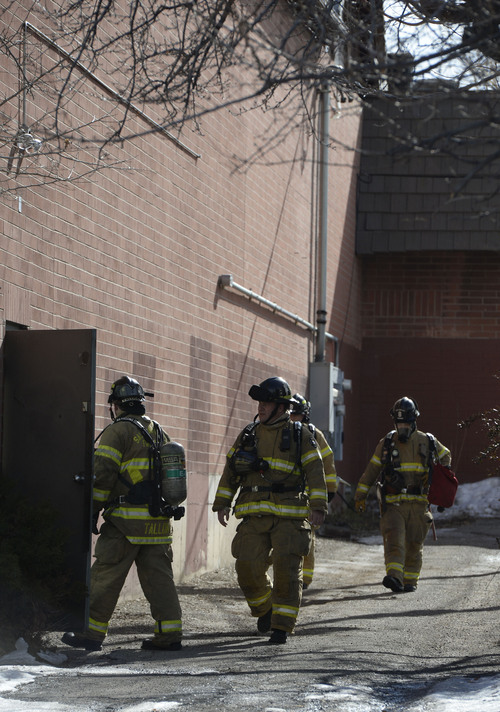 Francisco Kjolseth  |  The Salt Lake Tribune
Firefighters try to determine the source of the smell of smoke reported at the Chabad Community Center at 1760 South 1100 East in Salt Lake City on Monday, Feb. 3, 2014. Several children from the day care were safely removed as while the investigation continues.