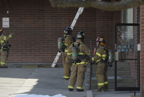 Francisco Kjolseth  |  The Salt Lake Tribune
Firefighters try to determine the source of the smell of smoke reported at the Chabad Community Center at 1760 South 1100 East in Salt Lake City on Monday, Feb. 3, 2014. Several children from the day care were safely removed as while the investigation continues.