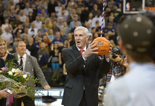 Scott Sommerdorf   |  The Salt Lake Tribune
Jerry Sloan pulls on the cord that caused his banner to be raised to the rafters during halftime as the Jazz hosted the Golden State Warriors, Friday, Jan. 31, 2014.