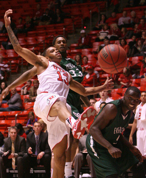 Leah Hogsten  |  The Salt Lake Tribune
Utah Utes guard Ahmad Fields (13) is fouled driving to the net. University of Utah defeated Evergreen State 128-44 Friday, November 8, 2013 at the Huntsman Center.