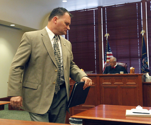 Al Hartmann  |  Tribune file photo
Clark Aposhian, Utah's chief gun rights activist and chairman of the Utah Shooting Sports Council, appeared in 3rd District Court on Tuesday. He is seeking to have his gun rights restored in connection with a protective order brought by his ex-wife over a Memorial Day incident. In this photo from earlier this month, Aposhian appeared Holladay Justice Court on four charges, including domestic violence.