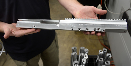 Steve Griffin  |  The Salt Lake Tribune

A piece of aluminum that is being manufactured into a rifle receiver at Desert Tech in West Valley City, Utah Friday, January 31, 2014. Desert Tech is a Utah gun manufacturer developing one of the more accurate military rifles on the market.