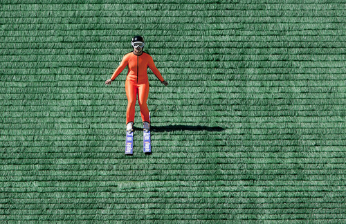 Steve Griffin | The Salt Lake Tribune

Lindsey Van, a member of the U.S. Women's Ski Jumping Team, lands softly on a synthetic surface that covers the ski jump during practice at the Utah Olympic Park in Park City, Utah Thursday June 20, 2013.