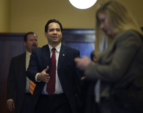 Scott Sommerdorf   |  The Salt Lake Tribune
Utah A.G. Sean Reyes greets people as he arrives at the Republican caucus to introduce attorney Gene Schaerr, who has been hired to defend Amendment 3, Thursday, Jan. 30, 2014.