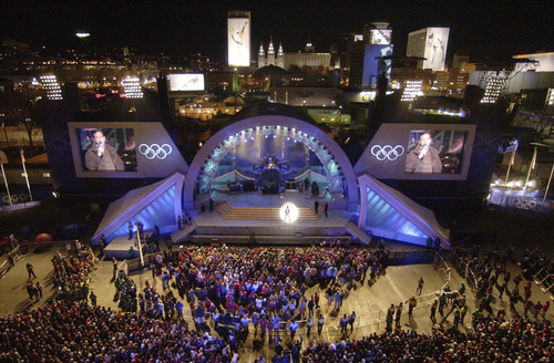 Steve Griffin | Tribune file photo
With downtown Salt Lake City in the background people surround the stage at the Olympics Medals Plaza during the opening night of the downtown venue Feb. 9, 2002.