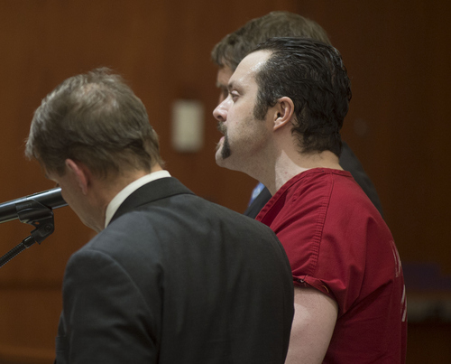 Keith Johnson | The Salt Lake Tribune/POOL

Nathan Sloop makes a statement to the court after Sloop pleaded guilty to the charges of aggravated murder and aggravated assault, during what was originally scheduled to be a pretrial conference in Judge Glen Dawson's courtroom, February 4, 2014 in Farmington, Utah. Sloop is accused of killing his stepson Ethan Stacy in 2010. Sloop stands next to his attorneys Richard Mauro, left, and Scott Williams,