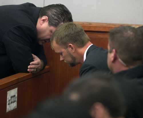 Keith Johnson | The Salt Lake Tribune/POOL

Prosecutor Troy Rawlings, left, talks to Joe Stacy, during what was originally scheduled to be a pretrial conference for Nathan Sloop in Judge Glen Dawson's courtroom, February 4, 2014 in Farmington, Utah. Sloop is accused of killing his stepson--Joe's biological son--Ethan Stacy in 2010. During the conference, Nathan Sloop pleaded guilty to the charges of aggravated murder and aggravated assault.