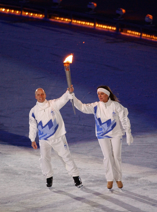 Francisco Kjolseth  |  Tribune file photo

Scott Hamilton and Peggy Fleming carry the Olympic torch a few moments prior to the lighting of the cauldron.