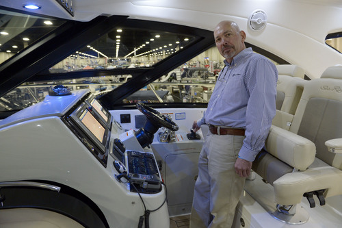 Francisco Kjolseth  |  The Salt Lake Tribune
Scott Schilling of Sundance Marine points out the joy stick, one of the coolest features on the 47ft Sea Ray that allows the operator to essentially parallel park the giant boat with the greatest of ease during the 60th annual Utah Boat Show at the South Towne Expo Center in Sandy on Thursday, Feb. 6, 2014.