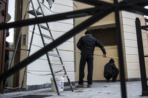 Chris Detrick |  The Salt Lake Tribune

Workers paint the outside of a building at the Gorky Gorod hotel complex in the Mountain Cluster in Krasnaya Polyana, Russia, before the start of the 2014 Sochi Olympics Wednesday February 5, 2014