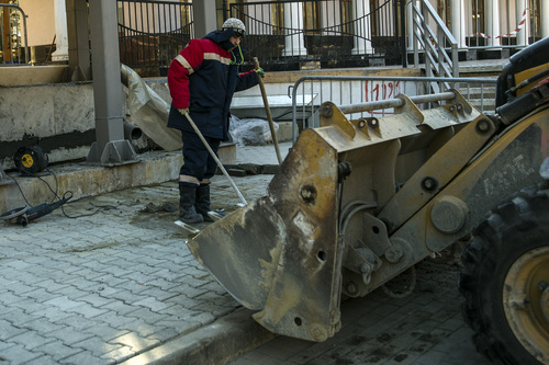 Chris Detrick |  The Salt Lake Tribune

Construction work continues on a sidewalk at the Gorky Gorod hotel complex in the Mountain Cluster in Krasnaya Polyana, Russia, before the start of the 2014 Sochi Olympics Wednesday February 5, 2014