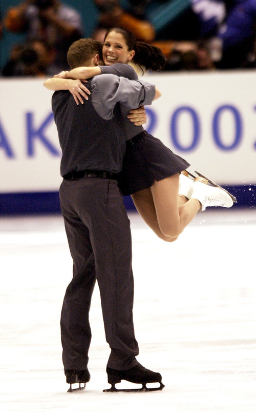 Steve Griffin  |  Tribune file photo
David Pelletier hugs and spins his partner Jamie Sale after finishing their program during the pairs free figure skating program at the Salt Lake Ice Center. The Canadian pair was awarded a gold medal following a judging controversy.
