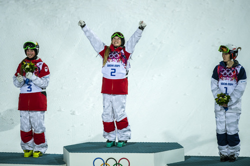 Chris Detrick  |  The Salt Lake Tribune
Justine Dufour-Lapointe, of Canada, celebrates after winning the Ladies' Moguls Finals at Rosa Khutor Extreme Park during the 2014 Sochi Olympic Games Saturday February 8, 2014. Justine Dufour-Lapointe won gold with a score of 22.44. Her sister Chloe Dufour-Lapointe won the silver with a score of 21.66. Hannah Kearney, of USA, won bronze with a score of 21.49.