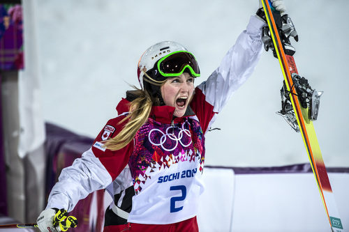 Chris Detrick  |  The Salt Lake Tribune
Justine Dufour-Lapointe, of Canada, celebrates after winning the Ladies' Moguls Finals at Rosa Khutor Extreme Park during the 2014 Sochi Olympic Games Saturday February 8, 2014. Justine Dufour-Lapointe won gold with a score of 22.44. Her sister Chloe Dufour-Lapointe won the silver with a score of 21.66. Hannah Kearney, of USA, won bronze with a score of 21.49.