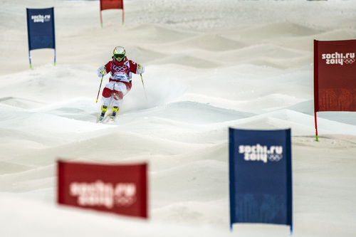 Chris Detrick  |  The Salt Lake Tribune
Chloe Dufour-Lapointe, of Canada, competes in the Ladies' Moguls Finals at Rosa Khutor Extreme Park during the 2014 Sochi Olympic Games Saturday February 8, 2014. Justine Dufour-Lapointe won gold with a score of 22.44. Her sister Chloe Dufour-Lapointe won the silver with a score of 21.66. Hannah Kearney, of USA, won bronze with a score of 21.49.