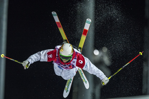Chris Detrick  |  The Salt Lake Tribune
Chloe Dufour-Lapointe, of Canada, competes in the Ladies' Moguls Finals at Rosa Khutor Extreme Park during the 2014 Sochi Olympic Games Saturday February 8, 2014. Justine Dufour-Lapointe won gold with a score of 22.44. Her sister Chloe Dufour-Lapointe won the silver with a score of 21.66. Hannah Kearney, of USA, won bronze with a score of 21.49.