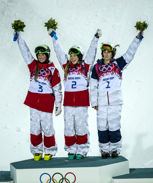 Chris Detrick  |  The Salt Lake Tribune
KRASNAYA POLYANA, RUSSIA  - JANUARY 8:
Justine Dufour-Lapointe, of Canada, her sister Chloe Dufour-Lapointe, and Hannah Kearney, of USA, celebrate after the Ladies' Moguls Finals at Rosa Khutor Extreme Park during the 2014 Sochi Olympic Games Saturday February 8, 2014. Justine Dufour-Lapointe won gold with a score of 22.44. Her sister Chloe Dufour-Lapointe won the silver with a score of 21.66. Hannah Kearney, of USA, won bronze with a score of 21.49.