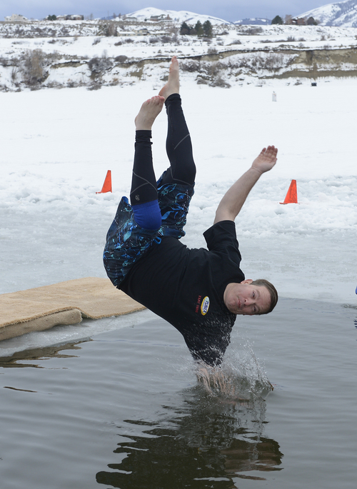 Scott Sommerdorf   |  The Salt Lake Tribune
Richard Blair makes a stylish jump into the Hyrum Reservoir. Participants in the Polar Plunge raised funds for Utah Special Olympics by jumping into the freezing water of the Hyrum reservoir, in Hyrum, Saturday, Feb. 8, 2014.
