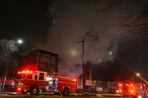 Scott Sommerdorf   |  The Salt Lake Tribune
A four-alarm fire broke out at the building under construction at 550 E, 500 S in Salt Lake City, Sunday, Feb. 9, 2014. What's left of the building can be seen in the lower left of this photo.