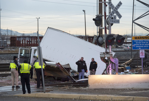 Steve Griffin  |  The Salt Lake Tribune


A FrontRunner train struck this truck at an intersection at 1800 N. and Warm Springs Road in Salt Lake City, Utah Thursday, February 13, 2014.