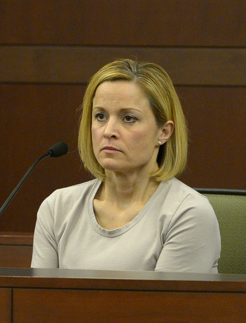 Leah Hogsten  |  The Salt Lake Tribune
Dea Millerberg testifies against her husband, Eric Millerberg, Wednesday, February 12, 2014 in 2nd District Court. Eric Millerberg is accused in the 2011 drug-related death of his childrenís 16-year-old baby sitter. Millerberg, 38, of North Ogden, is charged with first-degree felony child-abuse homicide in the September 2011 death of Alexis "Lexi" Rasmussen. He also is charged with felony counts of obstructing justice, desecrating a body and having unlawful sexual activity with a minor.