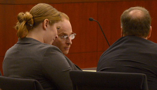 Leah Hogsten  |  The Salt Lake Tribune
L-r Eric Millerberg and his defense attorneys Haylee Mills and Randall Marshall listen to opening statements by Deputy Weber County prosecuting attorney Chris Shaw, Wednesday, February 12, 2014 in the trial for Eric Millerberg, accused in the 2011 drug-related death of his children's 16-year-old baby sitter. Millerberg, 38, of North Ogden, is charged with first-degree felony child-abuse homicide in the September 2011 death of Alexis "Lexi" Rasmussen. He also is charged with felony counts of obstructing justice, desecrating a body and having unlawful sexual activity with a minor.