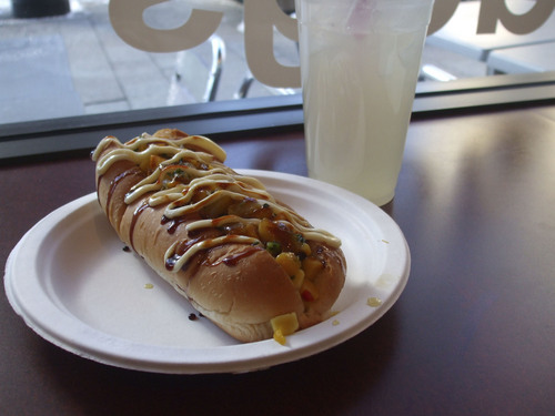 Kathy Stephenson  |  The Salt Lake Tribune
The Hawaii Five-O is a bacon wrapped Kobe-beef hot dog topped with pineapple salsa and drizzled with teriyaki and mayonnaise.