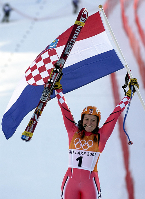 |  Tribune file photo

Janica Kostelic of Croatia takes to the podium for the flower ceremony after capturing the gold in the women's combined on Thursday, Feb. 14, 200.
