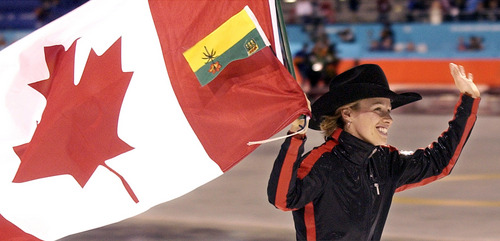 Steve Griffin  |  Tribune file photo

Catriona Le May Doan, of Canada, carries her country's flag while sporting a cowboy hat during her victory lap after winning the gold medal in the finals of the women's 500 meter speed skating at the Utah Olympic Oval on Thursday, Feb. 14, 2002.