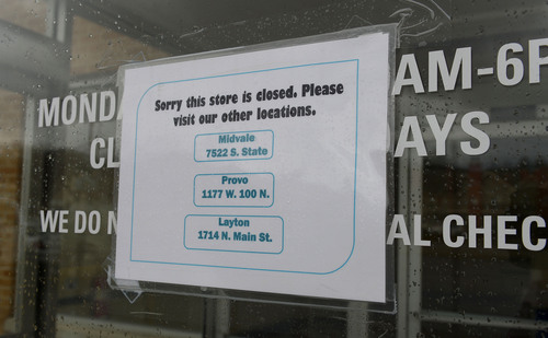 Leah Hogsten  |  The Salt Lake Tribune
A sign taped to the Franz Bakery Outlet front door 400 South and 700 East,Thursday, February 13, 2014. Bidding is open on the 3.18 acres formerly occupied by U.S. Bakery, just east of the intersection of 400 South and 700 East. The site is made up of the eight contiguous parcels that between them have access to heavily trafficked arteries of 700 East, 500 South and 400 South, which is also corridor for the University of Utah extension of the TRAX red line. Sale of the properties was announced Wednesday, with no listed price.