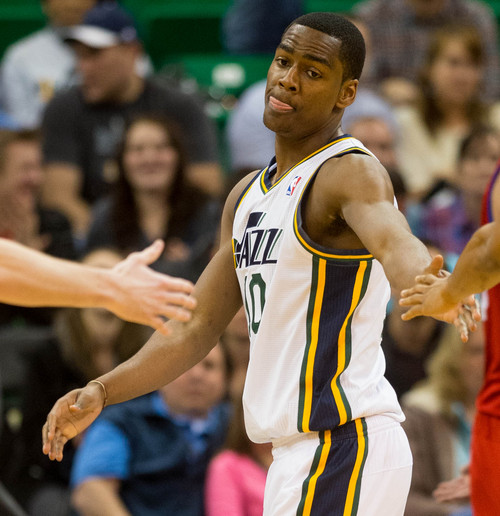 Trent Nelson  |  The Salt Lake Tribune
Utah Jazz point guard Alec Burks (10) high-fives teammates as he goes to the line  late in the fourth quarter as the Utah Jazz host the Philadelphia 76ers, NBA basketball at EnergySolutions Arena in Salt Lake City, Wednesday February 12, 2014.