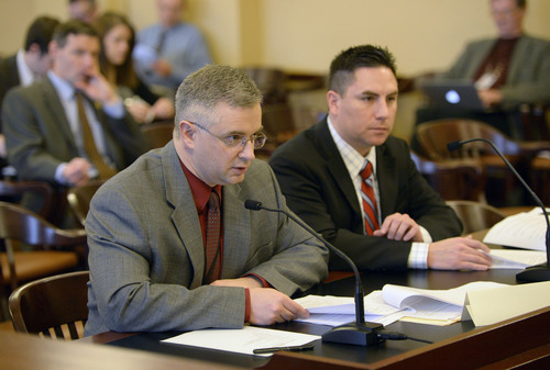 Al Hartmann  |  The Salt Lake Tribune 
Thomas Vaughn, Assistant General Counsel for Utah Legislature, left, and Mark Thomas, Director of Elections, Utah Lt. Governors office report to the House Special Investigative Committee investigating former Attorney General John Swallow.  The committee unveiled its recommendations for Utah's ethics and election laws Wednesday February 12.