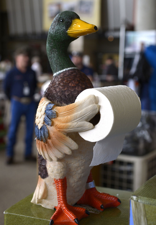 Leah Hogsten  |  The Salt Lake Tribune
A standing duck toilet paper holder for $39.38. The Utah Sportsmen's, Vacation & RV Show has plenty of eye-catching interests including RV's, trucks, ATV's, outdoor recreation equipment, RV accessories and dog agility demonstrations, cooking demos, a fly tie theater and Dutch oven cooking demos, Thursday, February 13-16, 2014  at the South Towne Expo Center.